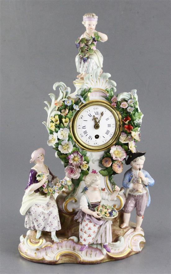 A Meissen porcelain mantel clock case, 19th century height 38cm, typical tiny losses